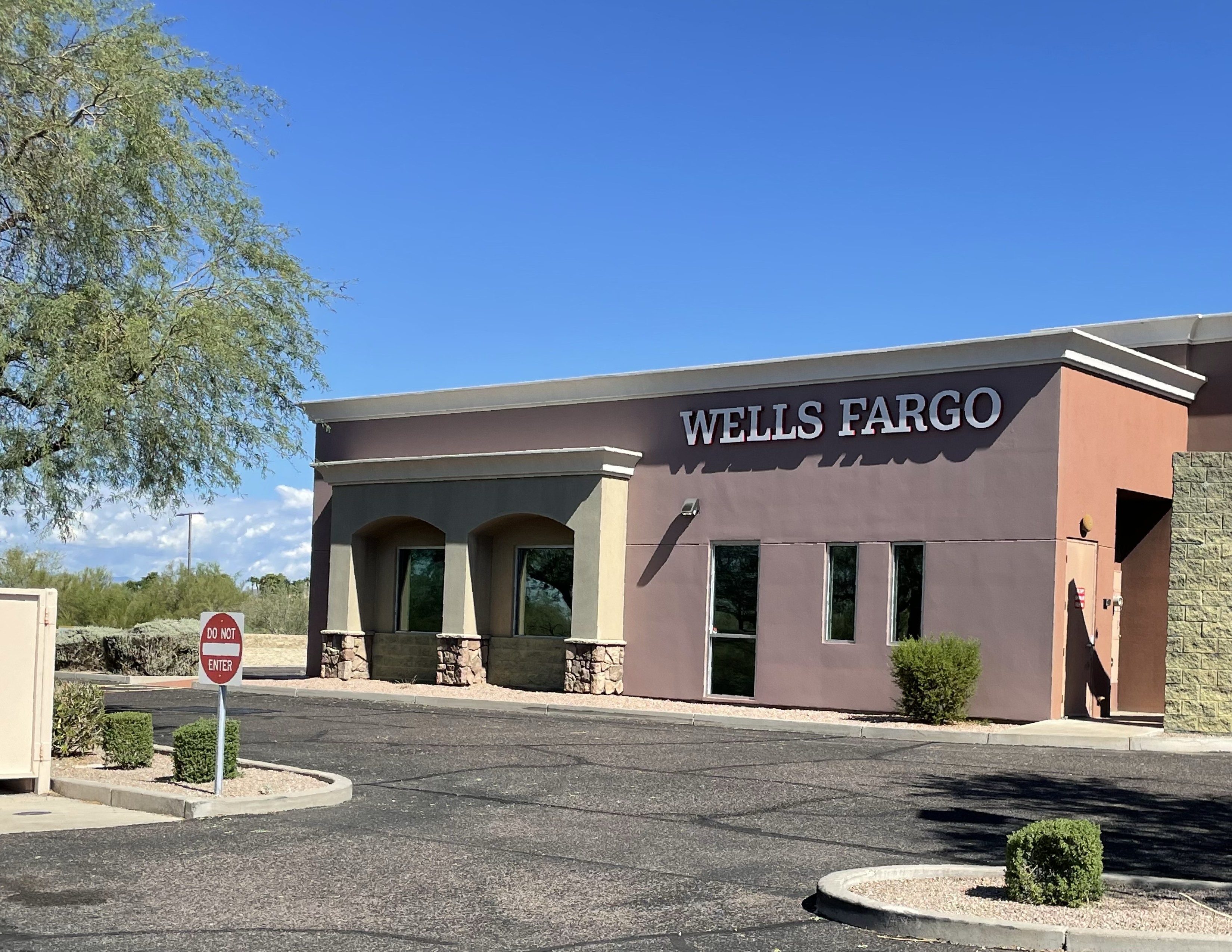 Close view of Arizona commercial glass receiving solar or specialty window film for comfort and UV protection.