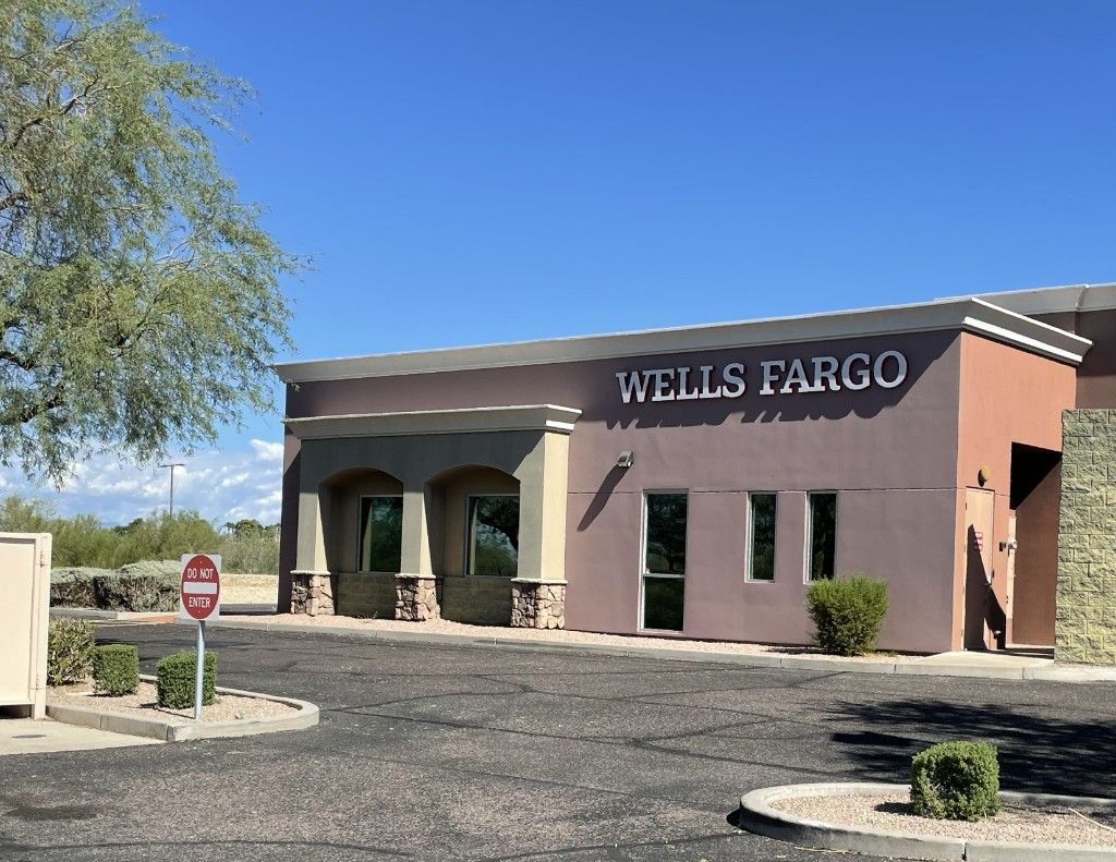 Commercial bank building exterior with reflective windows